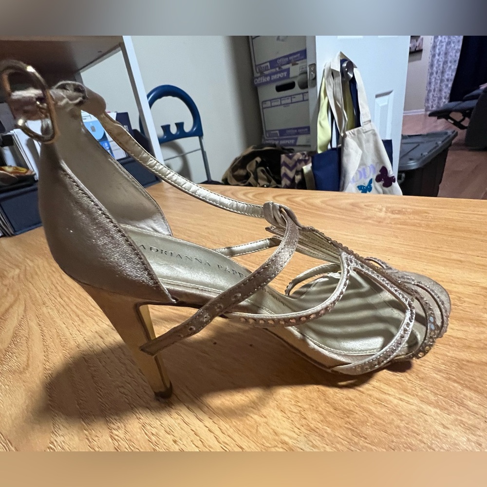 Gold high heel shoes